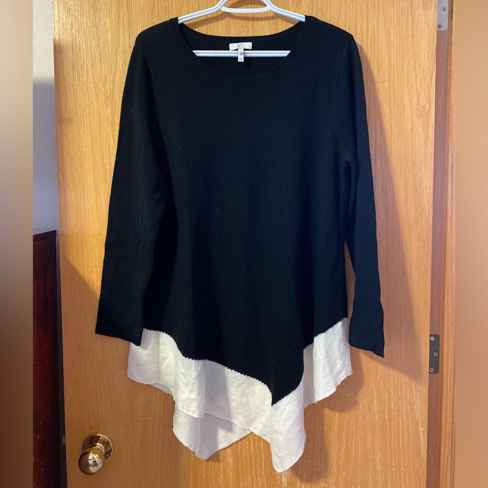 Long uneven hem sweater